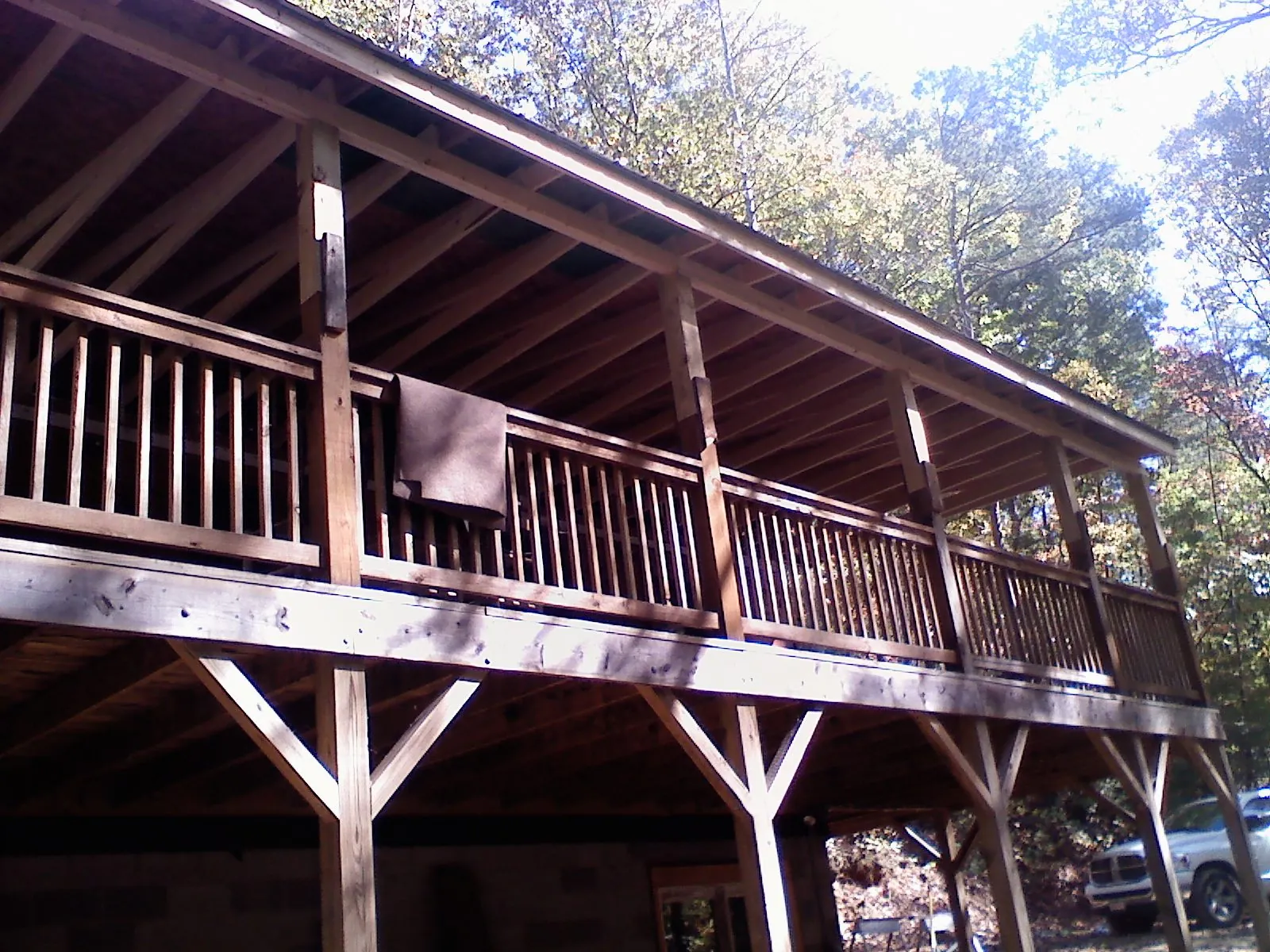 Timber framing under a new elevated porch and deck — Roof Leak Repair in Castleford by Roofing Brothers